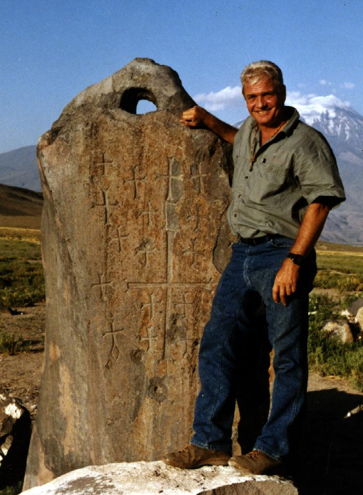David Fasold beside a massive pierced anchor stone in Kazan near Dogubayazit